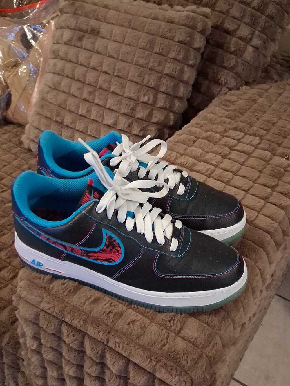 Nike Black Sneakers with Blue Lining and Red Patterned Swoosh